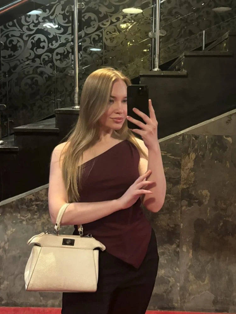 2025 nueva camiseta informal de moda para mujer Color sólido un solo hombro asimétrico ajustado Top cuello de una sola pieza