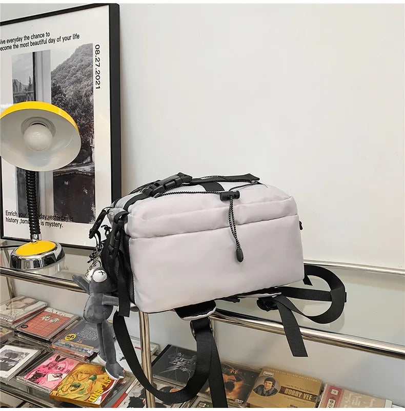 Mochila bolso de skate hombres mujeres moda fresco raya reflectante mochila estudiante mochila personalizada de gran capacidad YUNO STUDIOS